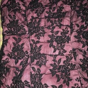Black and pink floral print textile